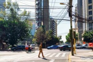 Pedestrian crossing a busy Phoenix intersection