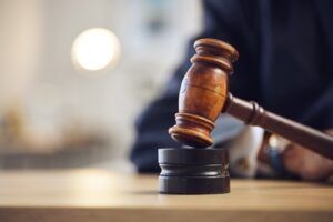 Judge's gavel on a sound block
